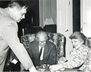 KAEC Executive Director Frederick Carriere presents a ham to Mrs. Fulbright.